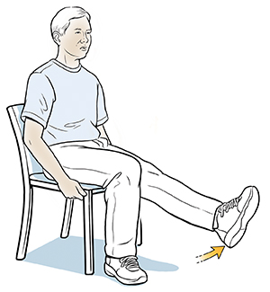 Man sitting in chair doing leg lift exercise.